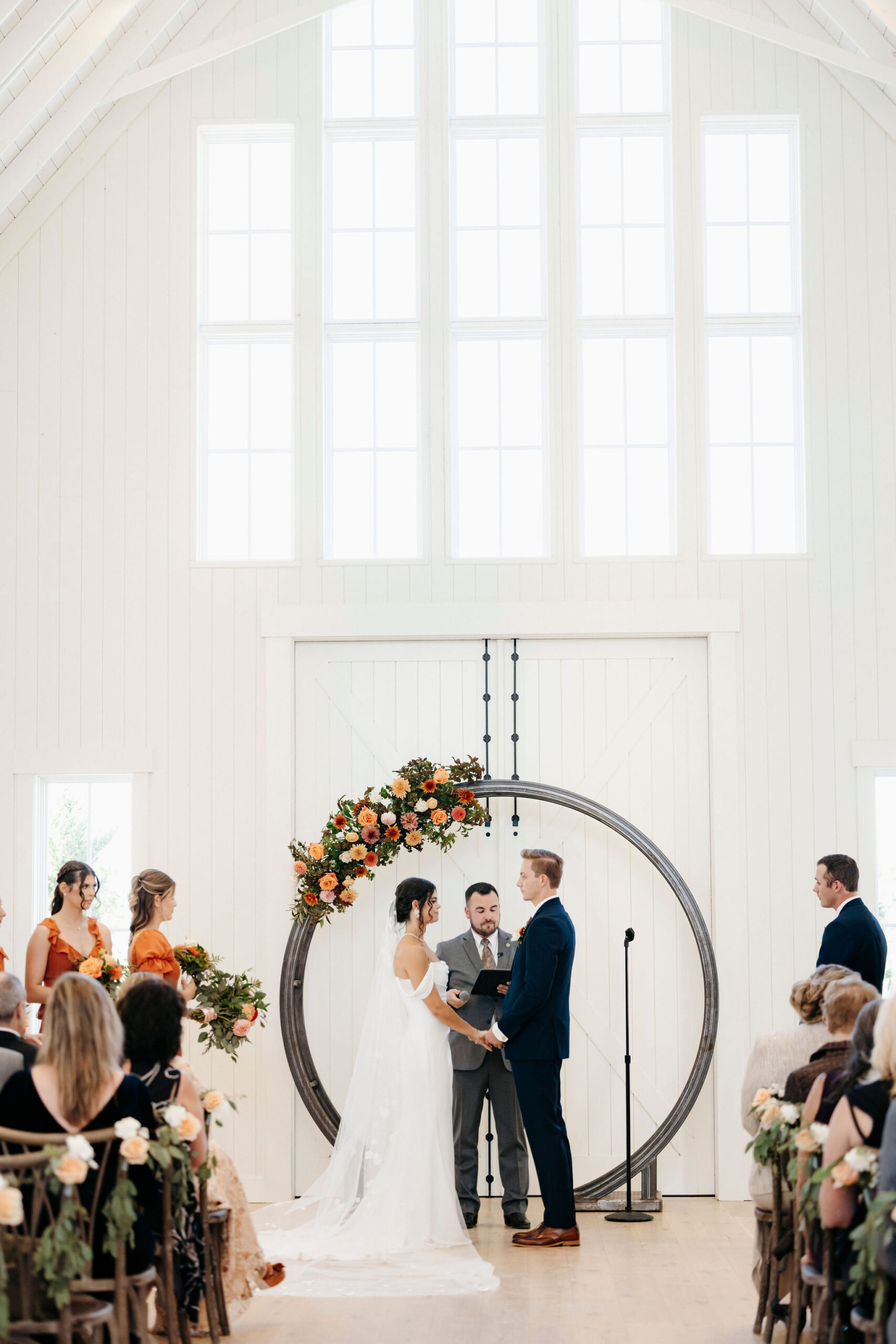 Rustic elegant wedding at Redeemed Farm Minnesota with vineyard views